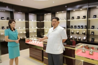 Illustration for article titled 'Look At My Fancy New Airport Terminal,' Says Noted Despot Kim Jong Un